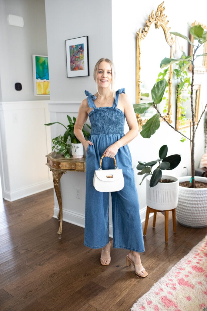 woman wearing denim jumpsuit and heels