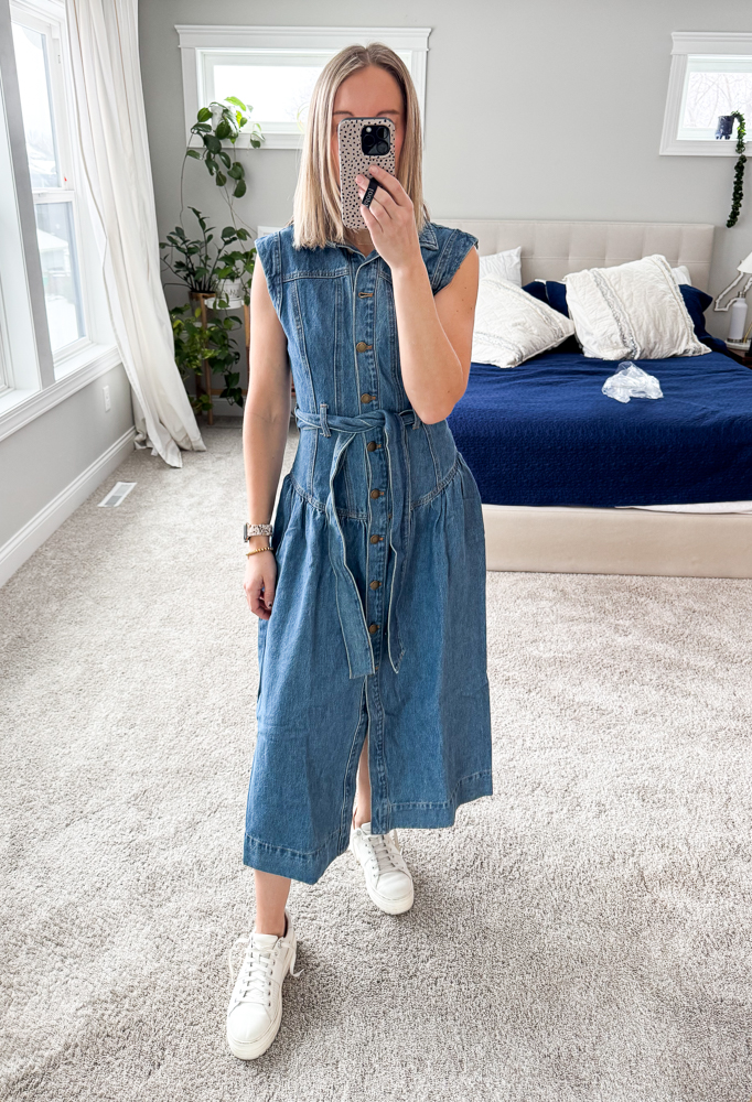 Denim drop waist dress styled with sneakers for a casual yet elevated summer look.