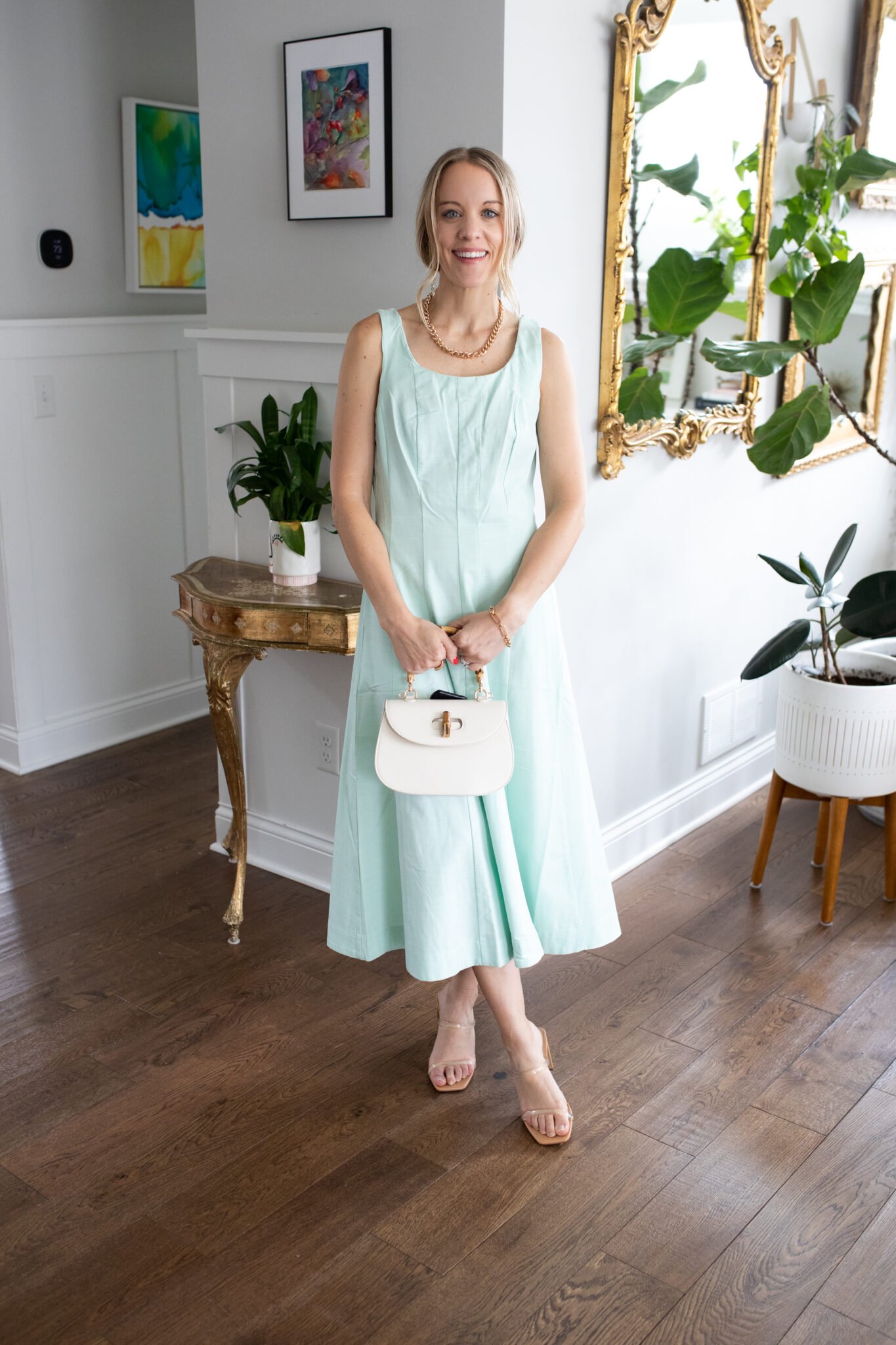Mint green corset-style A-line midi dress with a U-neckline and side pocket, perfect for as a Wedding Guest dress.