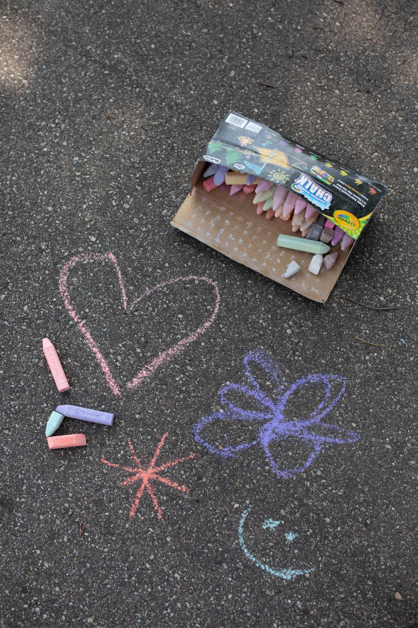 Colorful washable chalk to draw on the sidewalk, creating art and having fun ( Screen-Free idea )