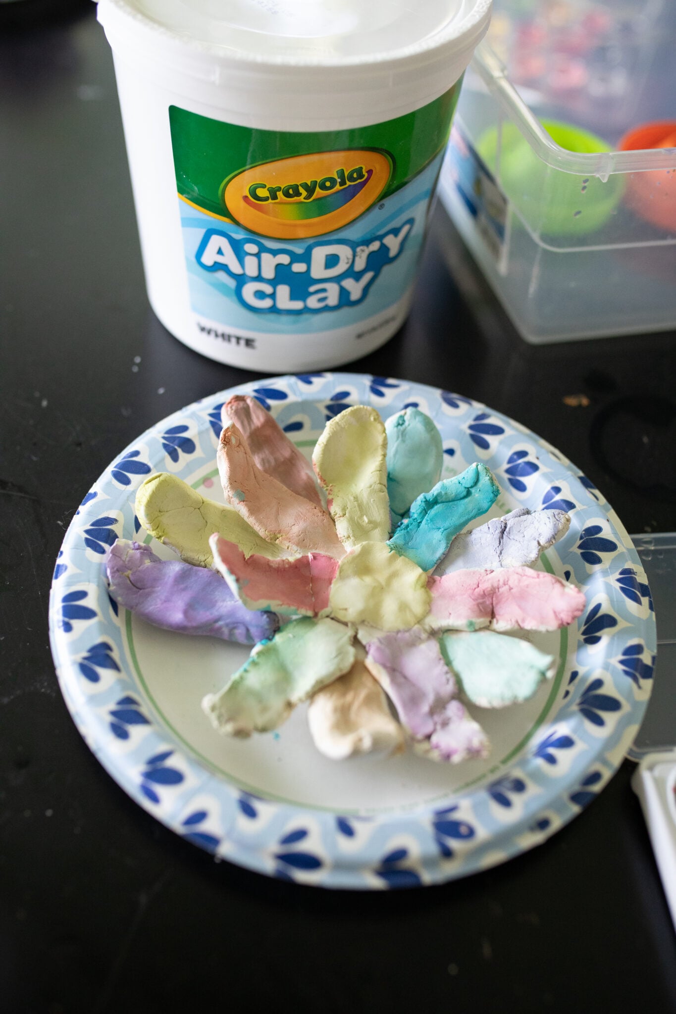 Crayola Air Dry Clay to mold and create fun crafts, showing off their projects. ( Screen-Free idea )