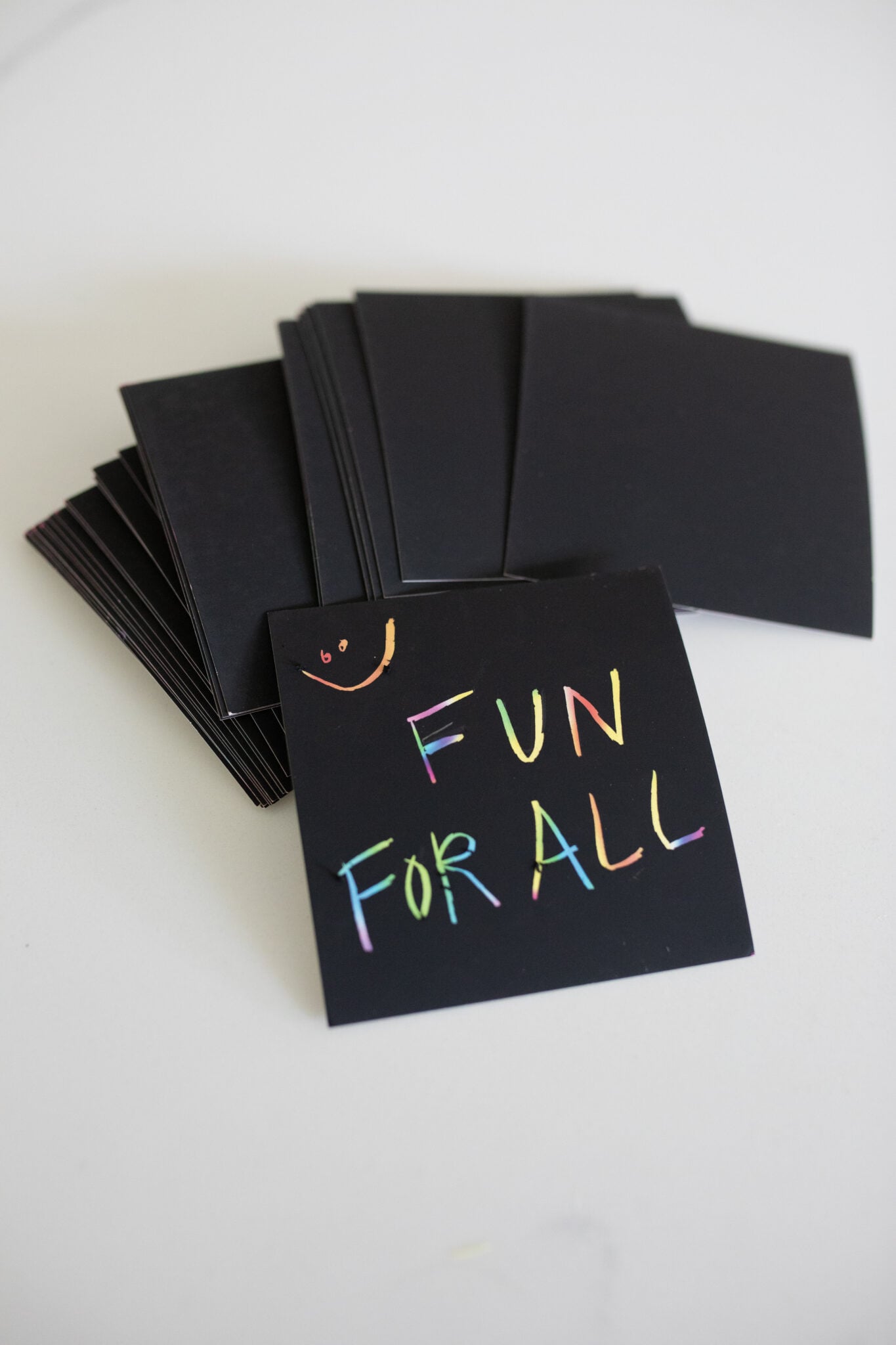 Wooden stylus to scratch off designs on black scratch sheets, revealing vibrant rainbow colors underneath. ( Screen-Free idea )