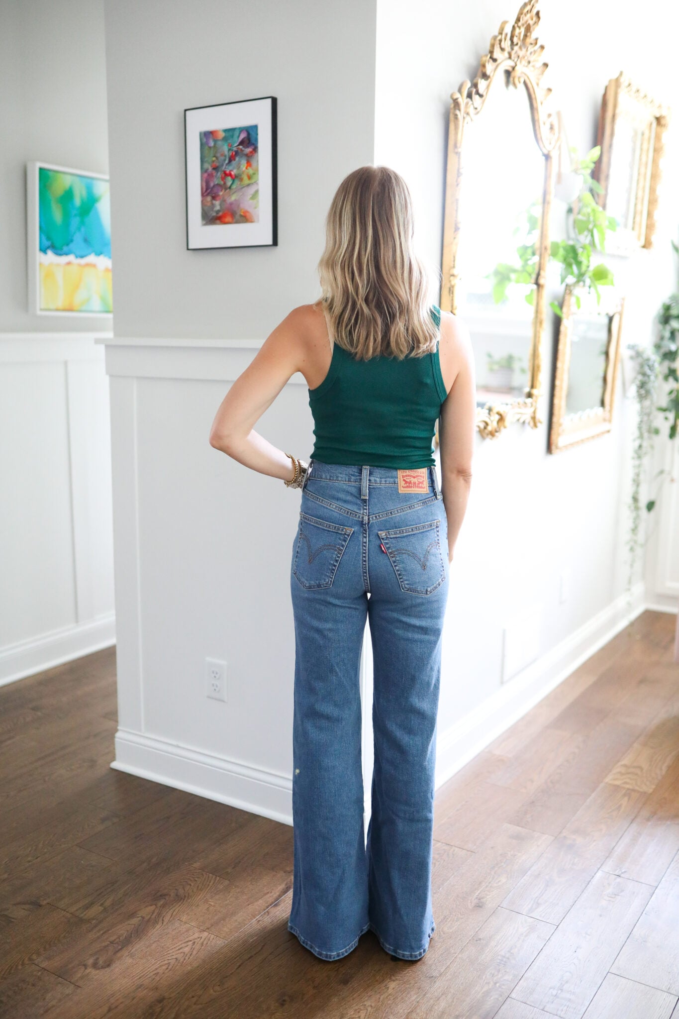 Jen wearing Levi's Jeans: WRibcage Bell Bottom Jeans in a size 25 from the back