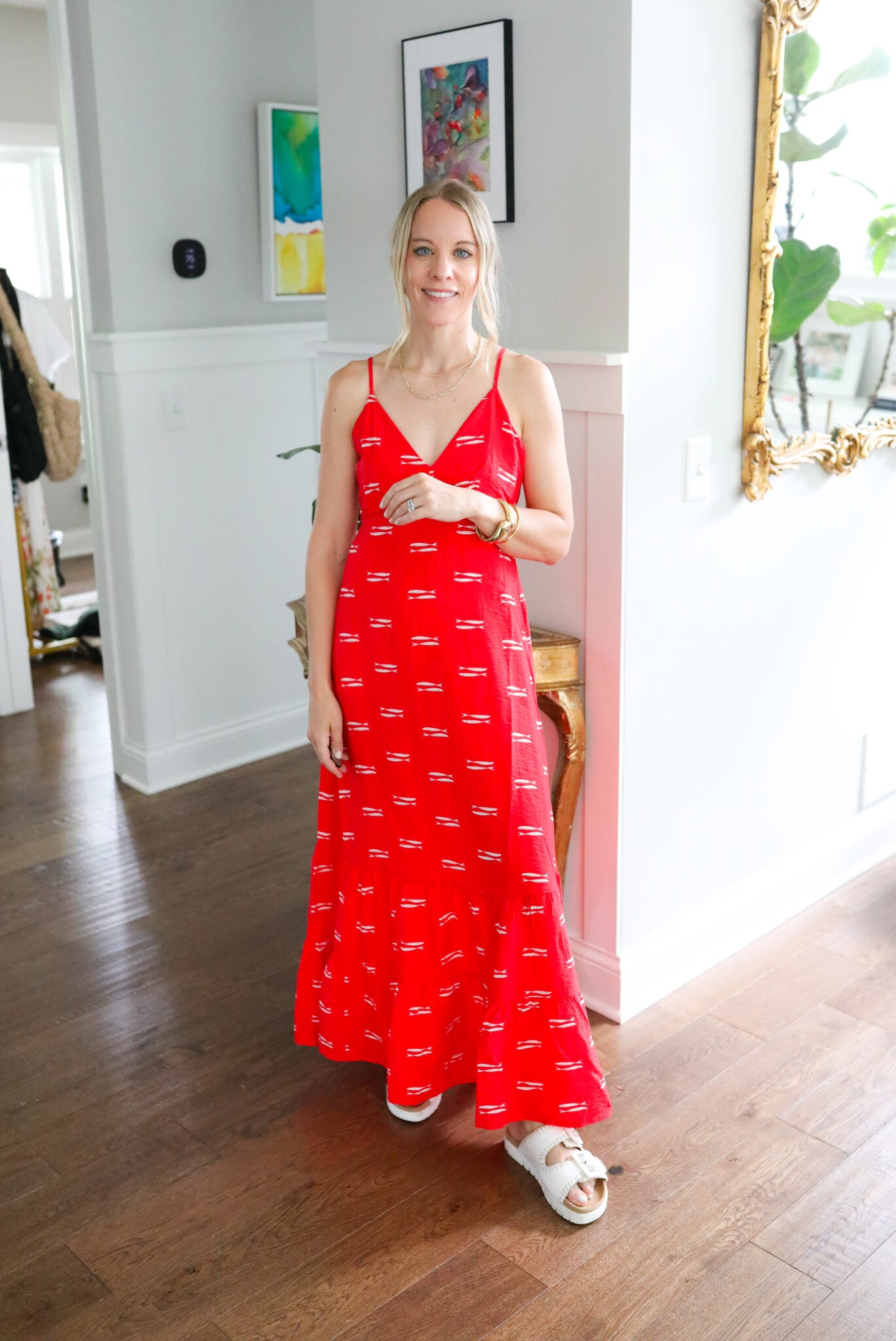 red and white open back maxi dress, perfect for beach days or vacations.