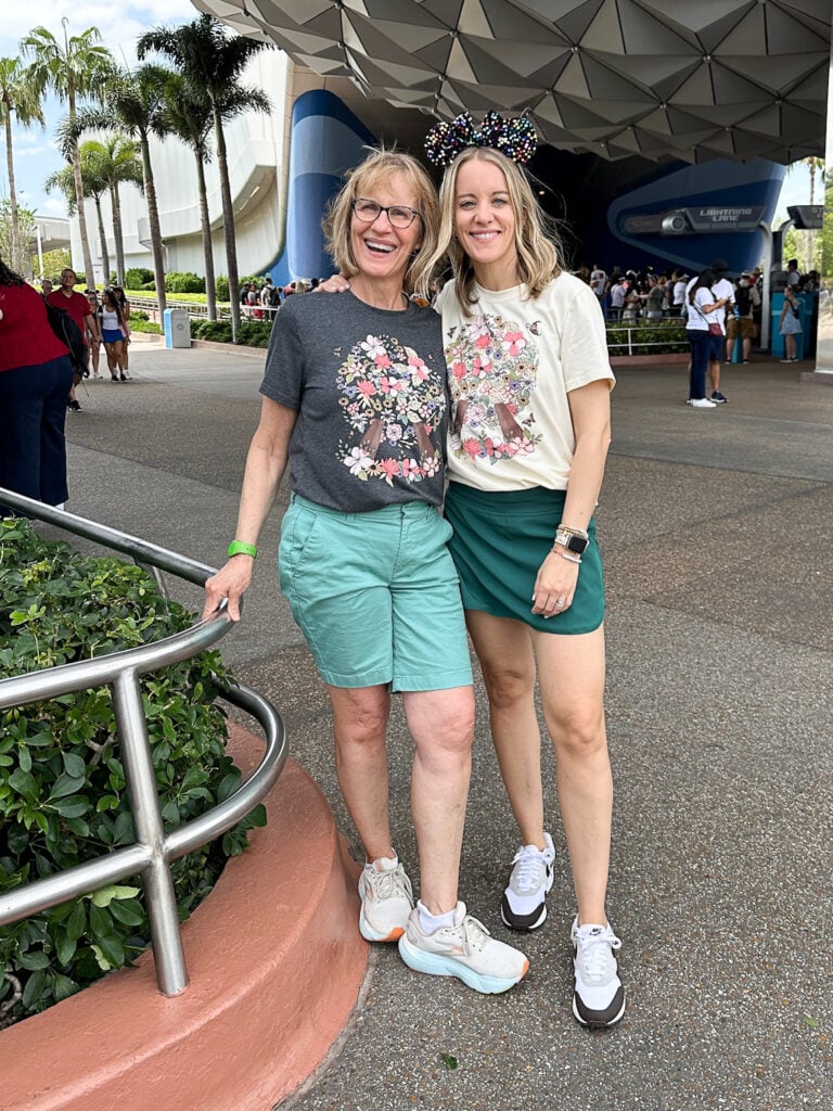 Two women wearing Disney Epcot shirts in Epcot