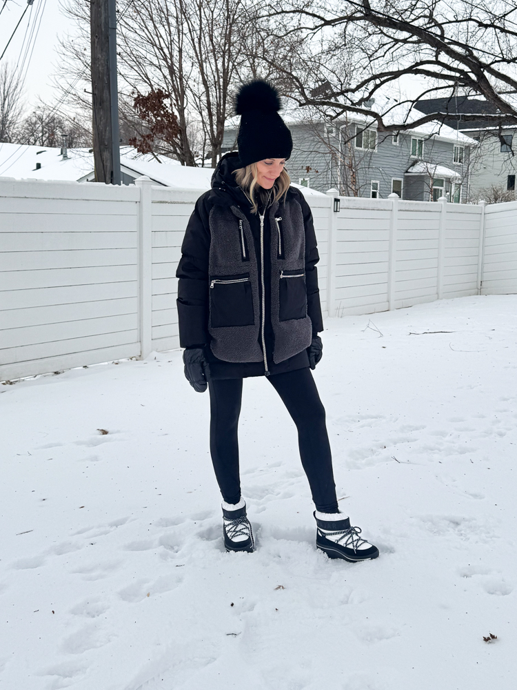 Woman in Amazon jacket and low profile boots