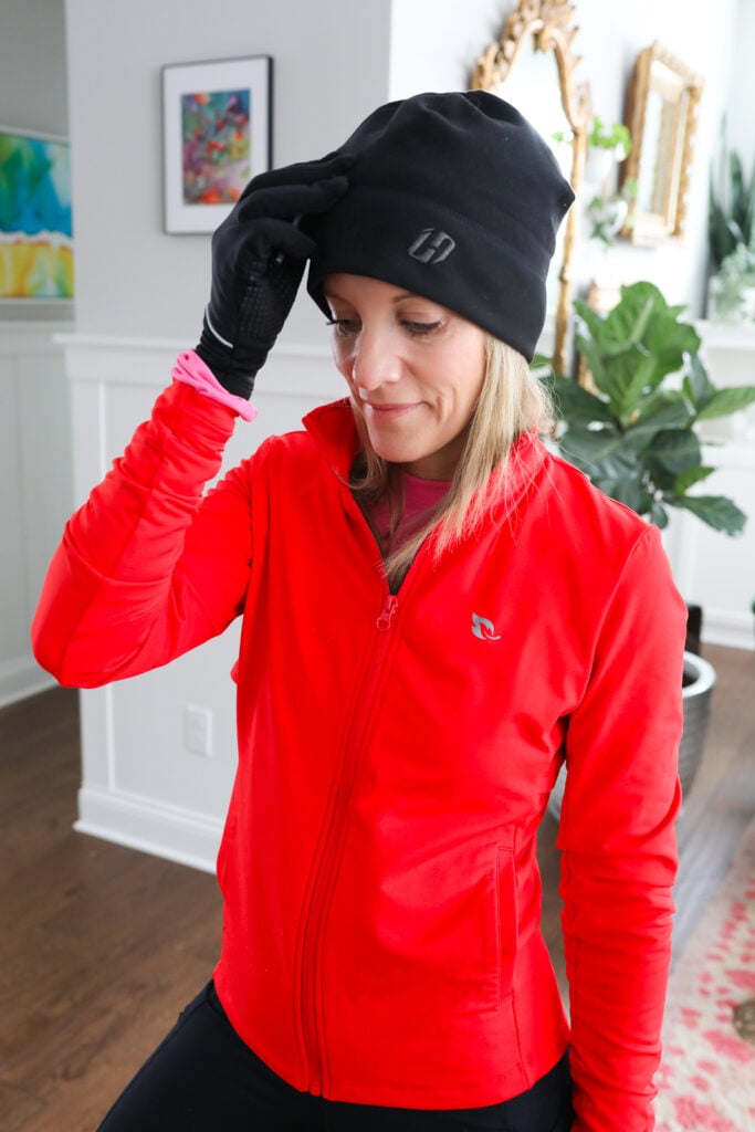 Woman in black running hat for winter