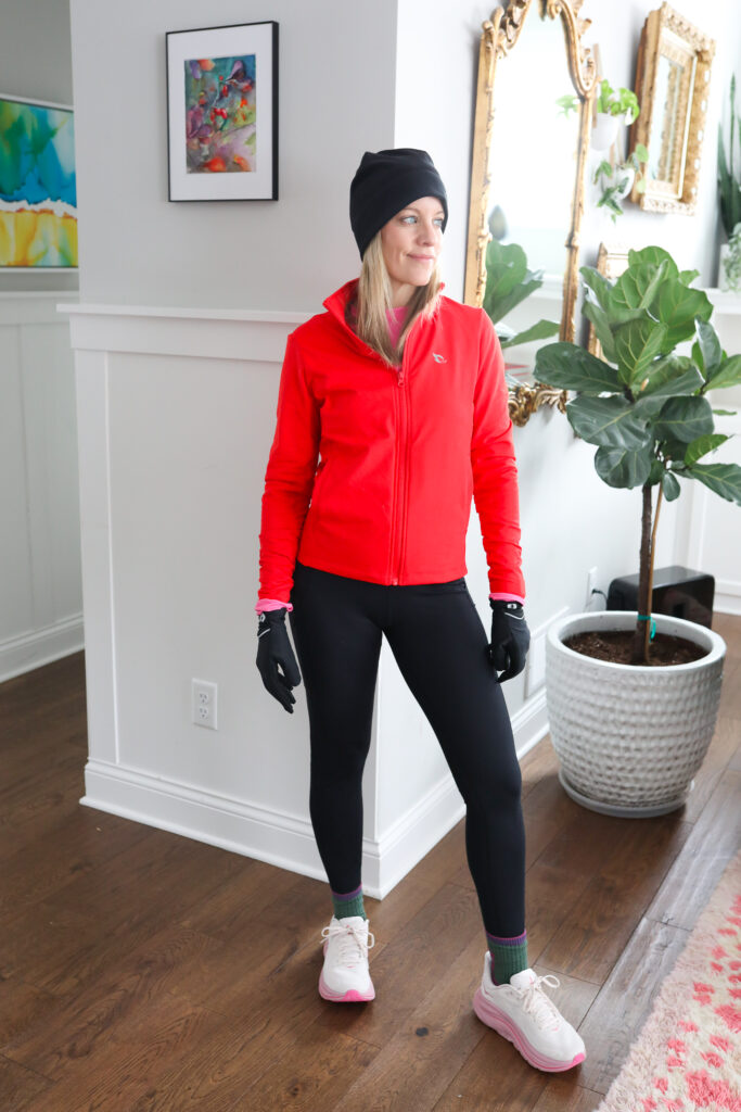 Woman in winter running clothes